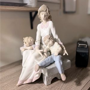 Afternoon nap. Mother and children Lladró